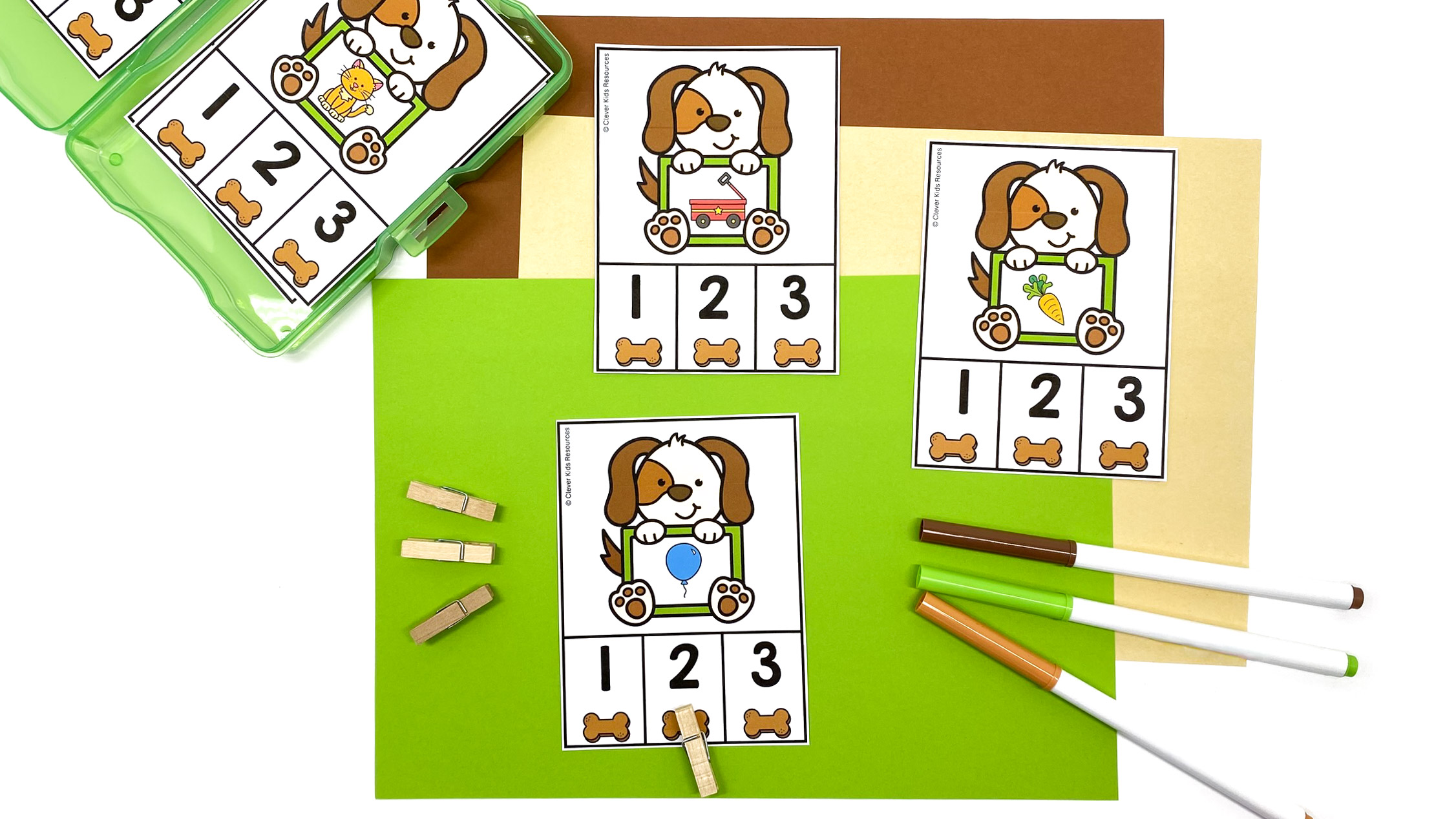 Hands-on phonological awareness activity with dog clip cards where kids count syllables using clothespins.