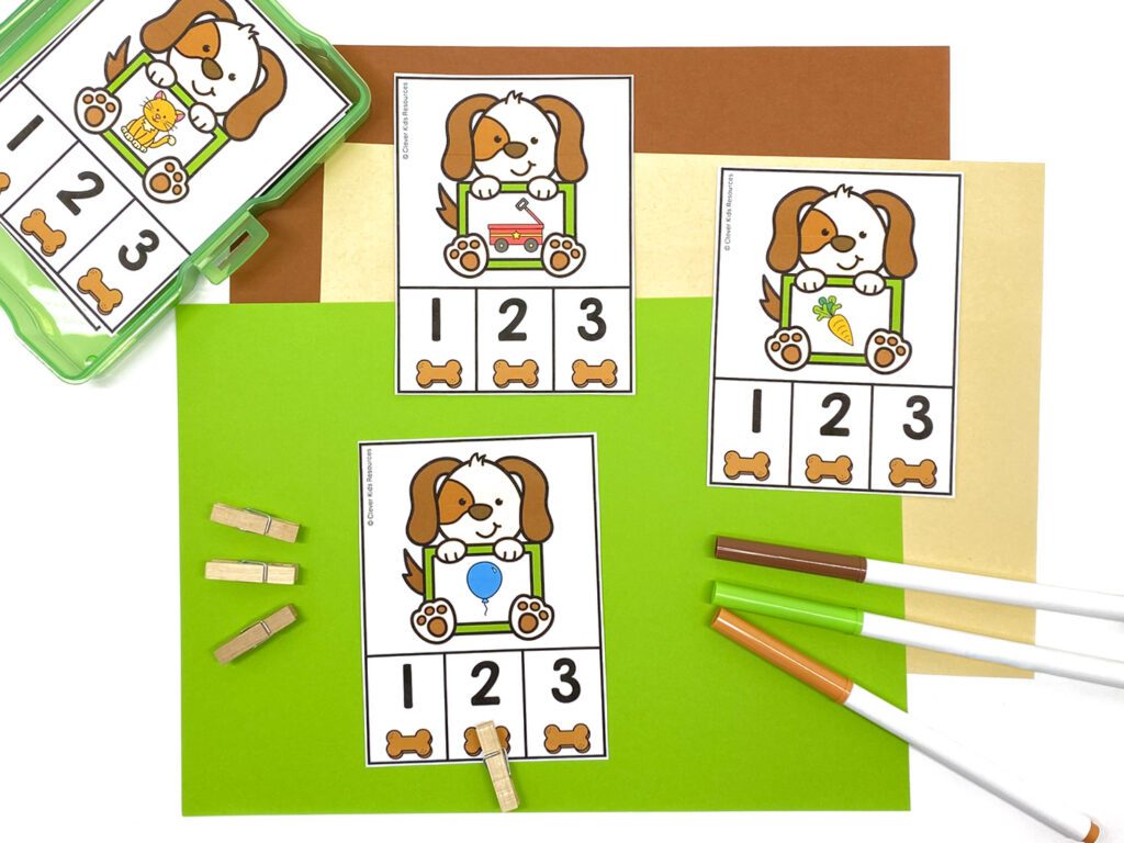 Printable puppy clip cards for teaching syllables in preschool and kindergarten literacy centers.
